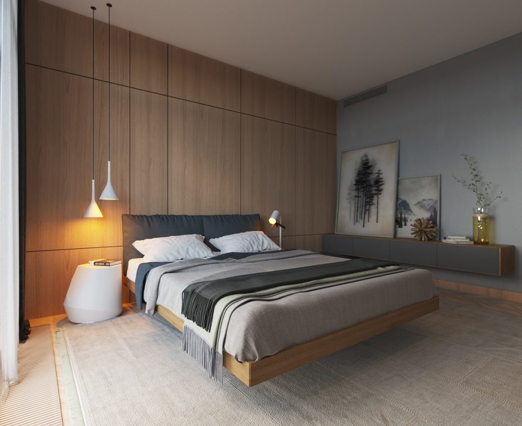Phòng ngủ này sử dụng các tấm ốp bằng gỗ tự nhiên để tạo ra sự sang trọng và tinh tế cho không gian. Bên cạnh đó, để căn phòng thêm lung linh và đẹp mắt các nhà thiết kế cũng bố trí thêm đèn ngủ hình phễu úp ngược tỏa ra ánh sáng vàng, tranh treo tường nghệ thuật…